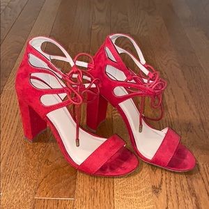Red heels with laced up ankles